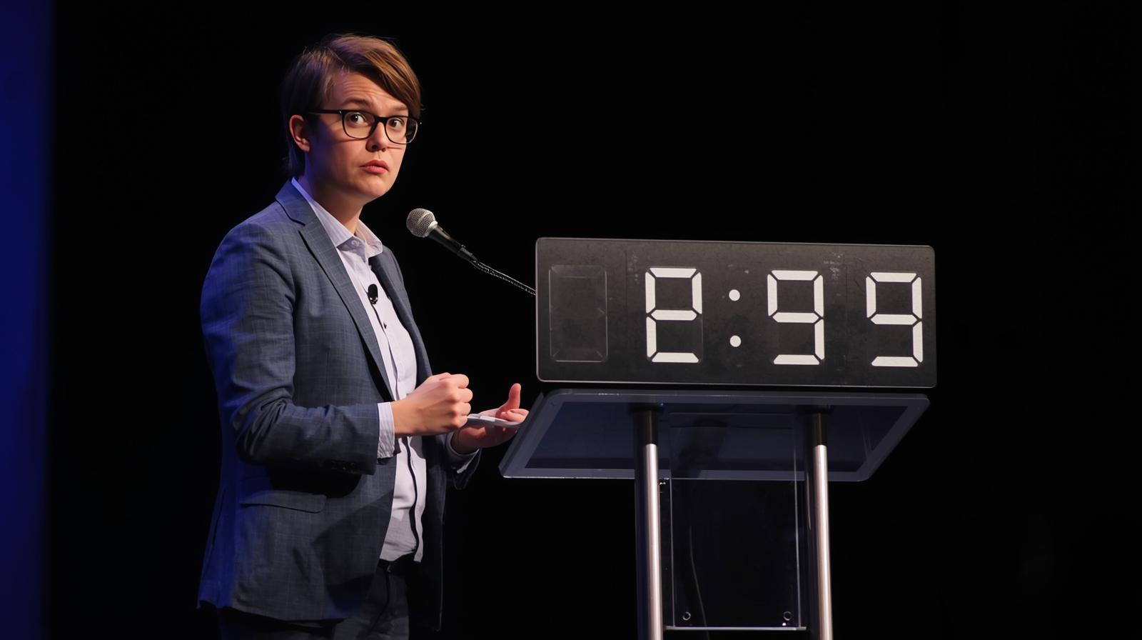 Speaker using a countdown timer to manage presentation time and reduce anxiety