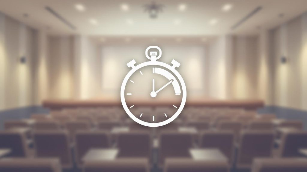 Presenter using a digital countdown timer during a live event to maintain smooth session flow.